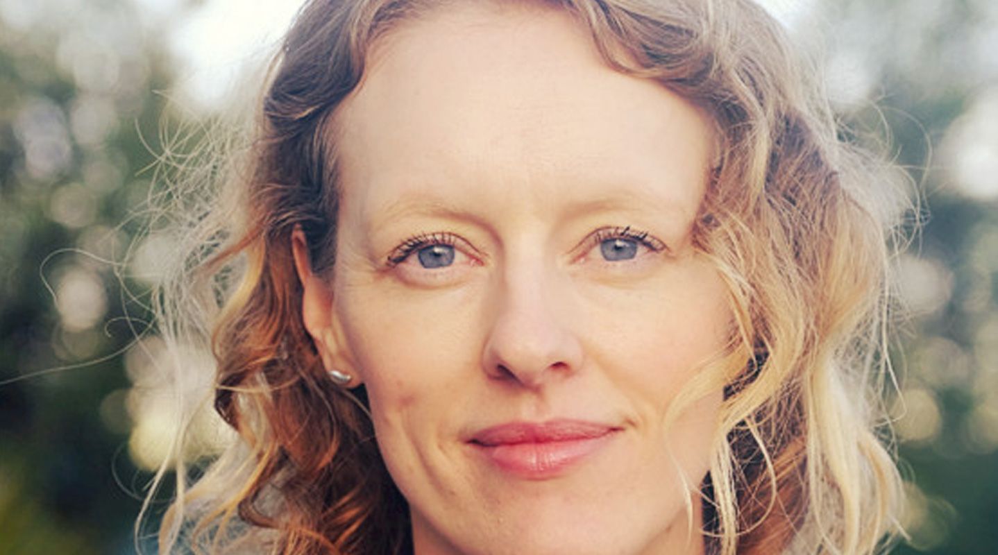 Woman smiling outdoors