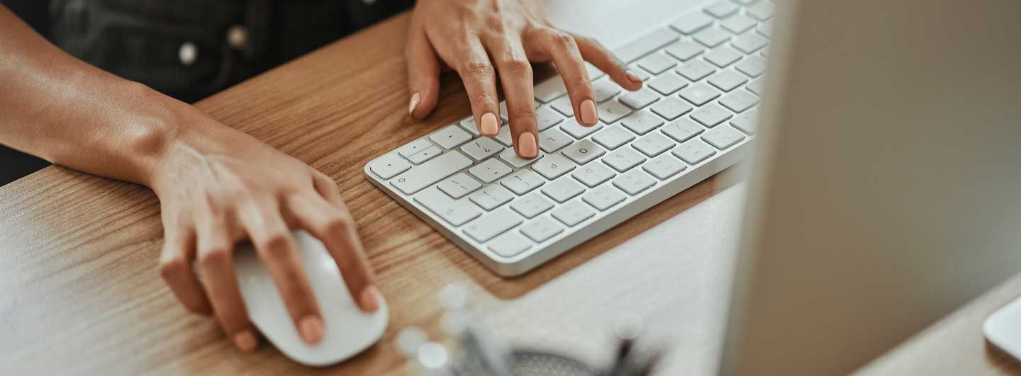 Hands at a keyboard