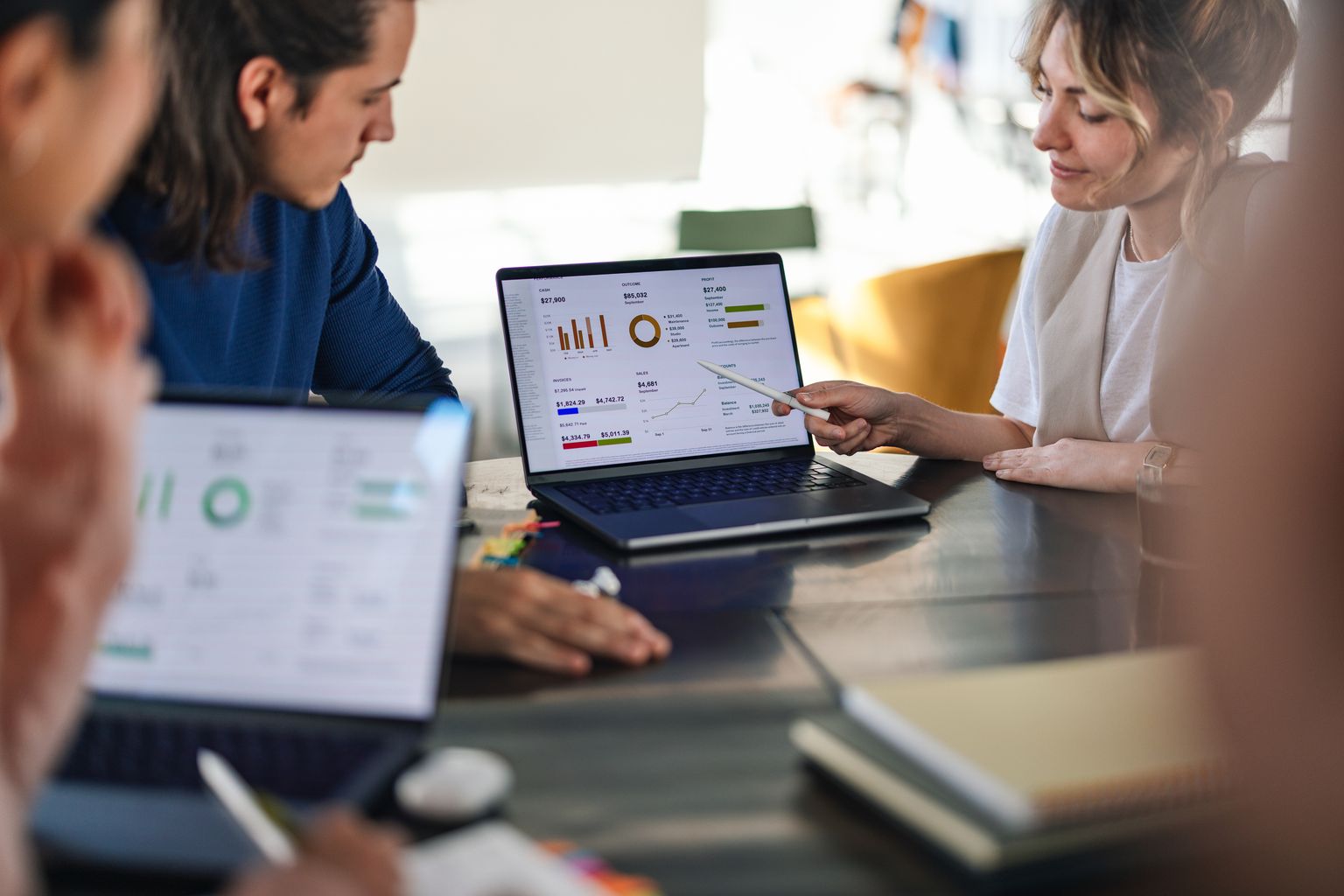 Colleagues reviewing email marketing stats