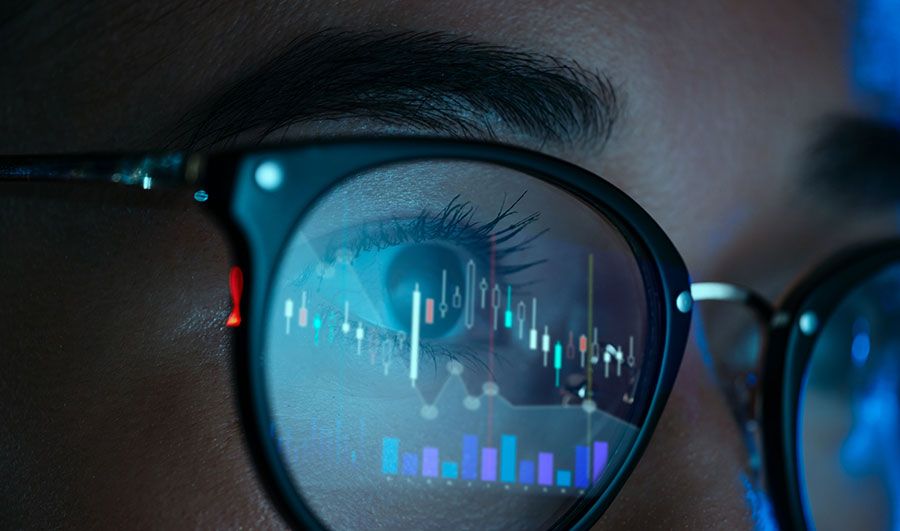 Close up of eye looking at data