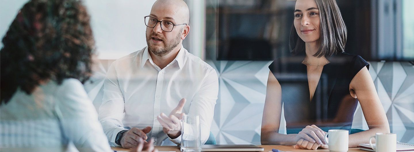 Three people meeting