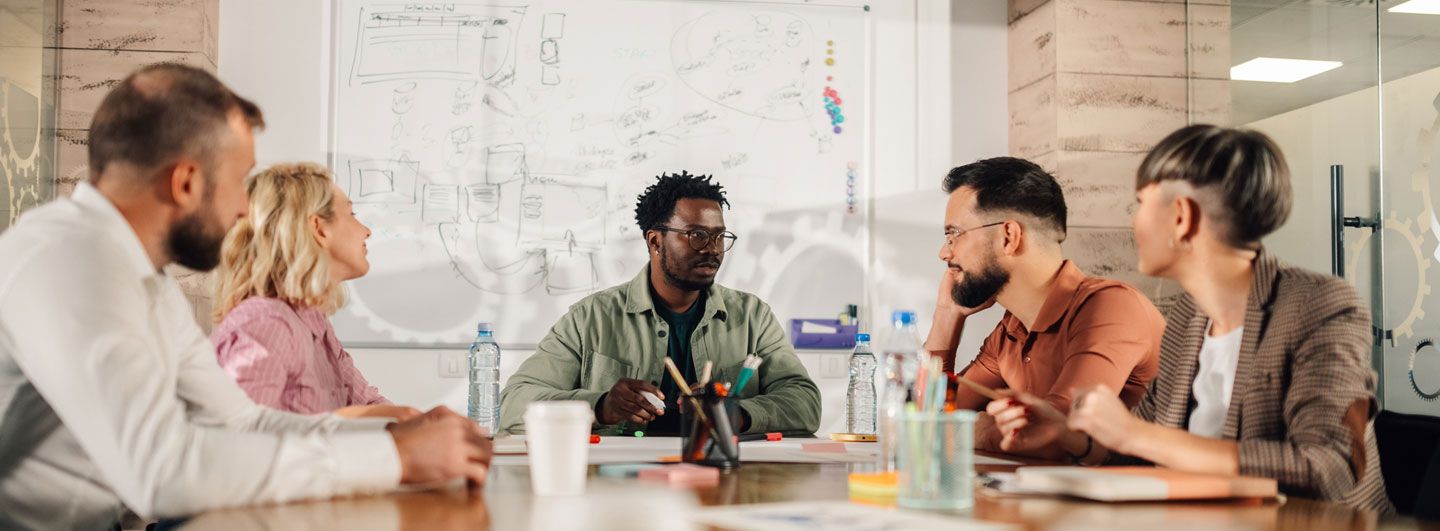 People talking at desk