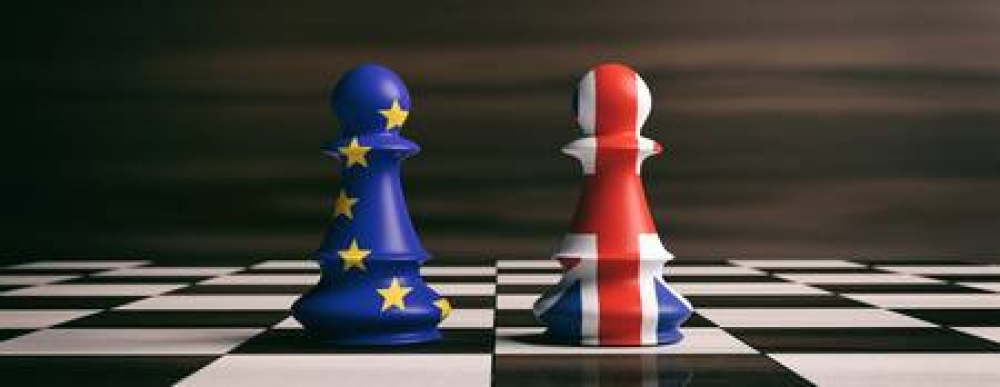T-93283270-brexit-concept-great-britain-and-european-union-flags-on-chess-pawns-soldiers-on-a-chessboard-3d-ill.jpg